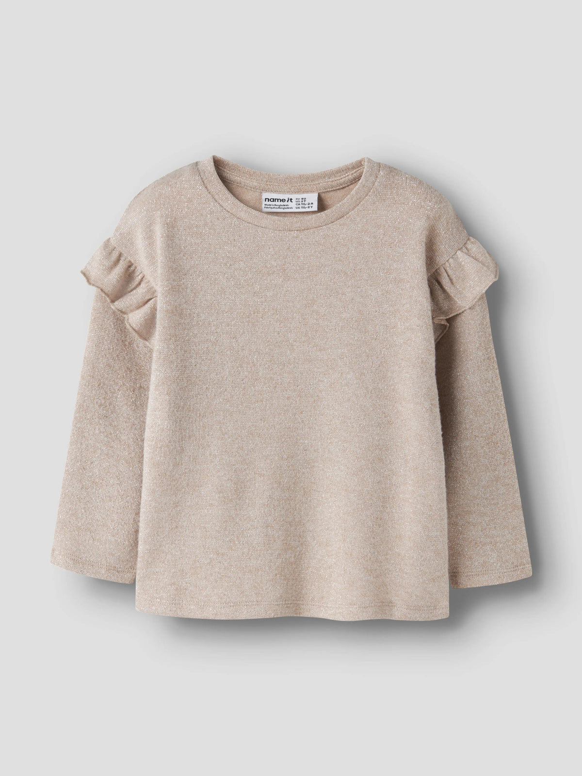 Rammi glittrig långärmad topp till flicka med volanger i beige från Name It