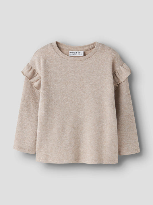 Rammi glittrig långärmad topp till flicka med volanger i beige från Name It