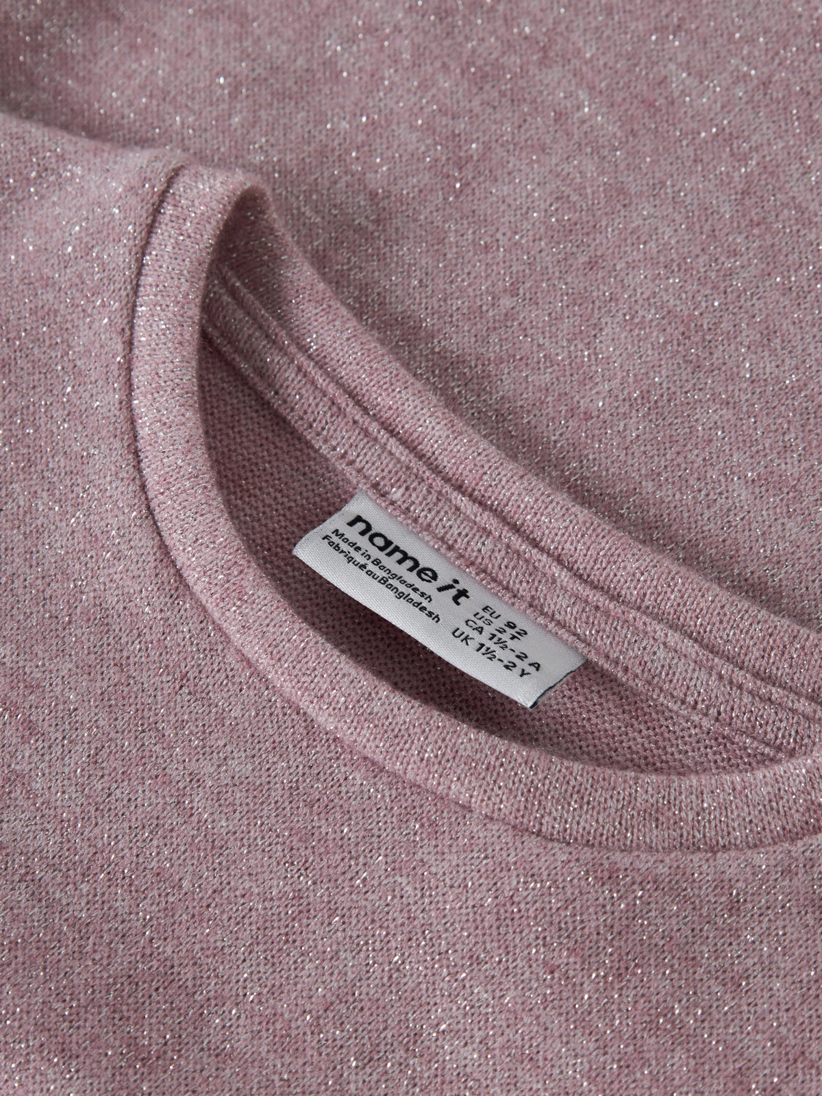 Rammi glittrig långärmad topp till flicka med volanger i rosa från Name It