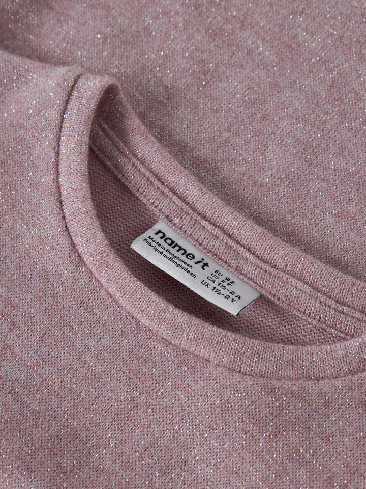 Rammi glittrig långärmad topp till flicka med volanger i rosa från Name It