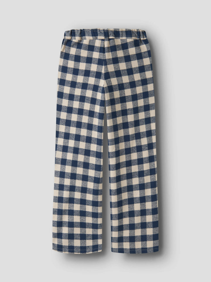 Name It Raluq rutiga flanellbyxor för pojke i mörkblått och beige med vida ben och knytband.