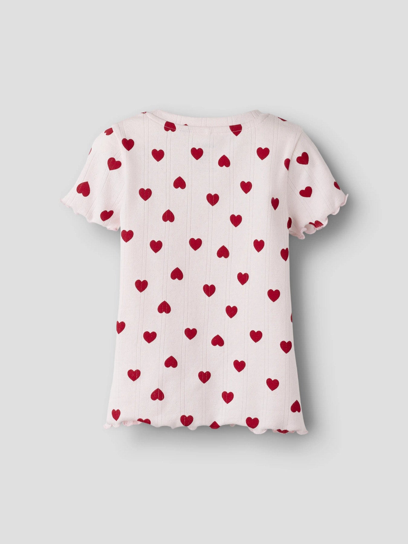 Rosa söt topp till flicka från Name it. Barn t-shirt med hjärtan i rosa och rött, ekologiska barnkläder till flicka.
NMFHILARY SS TOP
13262296