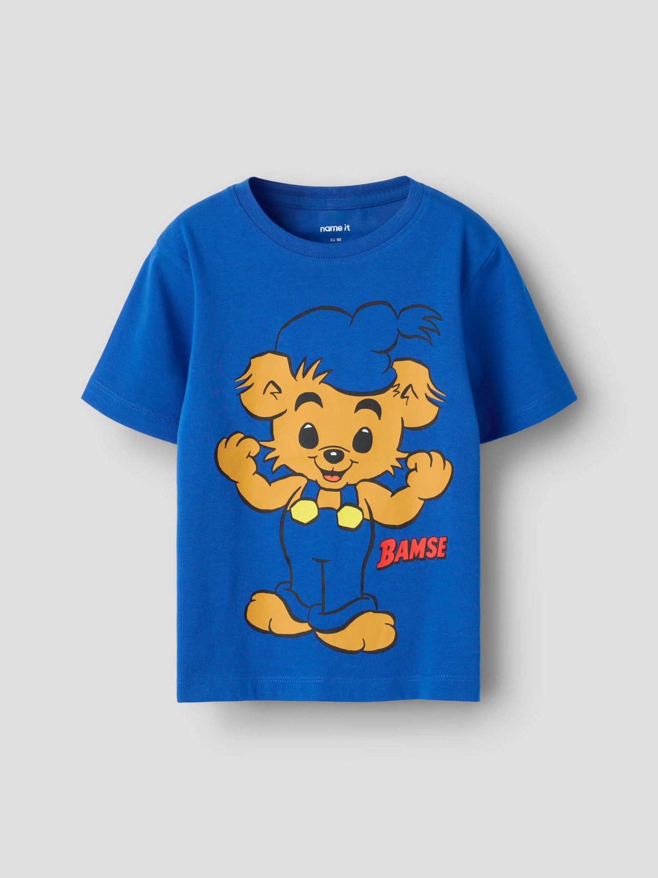 Kortärmad Bamse t-shirt i Strong Blue från Name It för pojke.