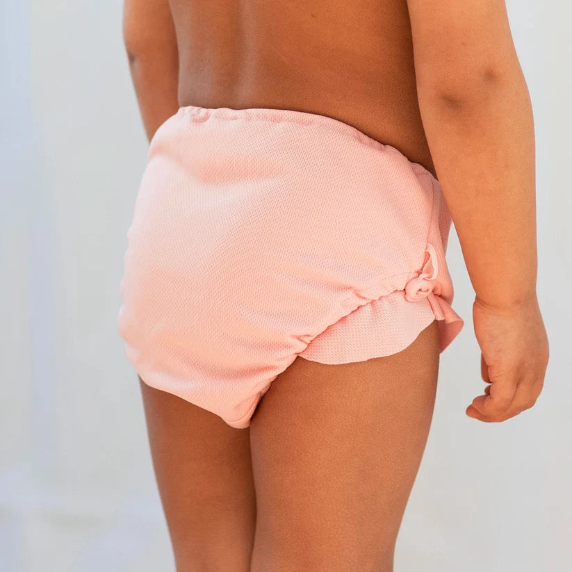 Rosa blöj bad byxa till bebis flicka. Badbyxor till babysim blöjbadbyxa från Geggamoja.