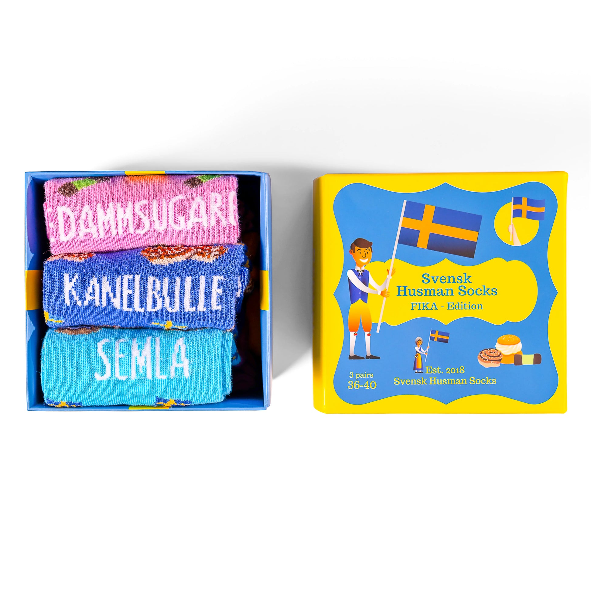 3 pack herr och dam strumpor med svenskt fika som tema. SVENSK HUSMAN FIKA STRUMPOR 
3-sorters rolia mönstrade färgglada fika-strumpor, damsugare, semla och kanelbulle strumpor

