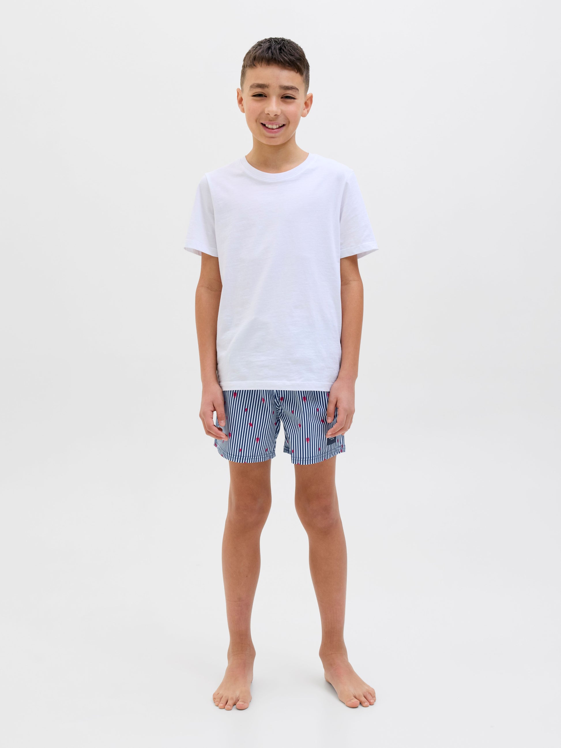 Randiga badshorts till kille från Jack & Jones. Blå vita shorts badkläder till ungdom.
JPSTMAUI JJSWIM MINI STRIPE AKM JNR
12273846