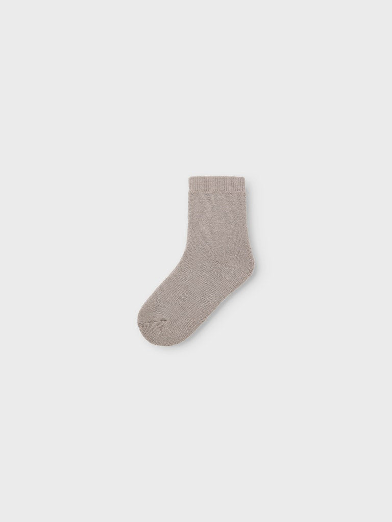 Grå tjocka merino ull strumpor till pojke och flicka. Varma barn strumpor, tjockstrumpor i ull från Name it.
NMFWAKSI WO/BL TERRY SOCK
13228513