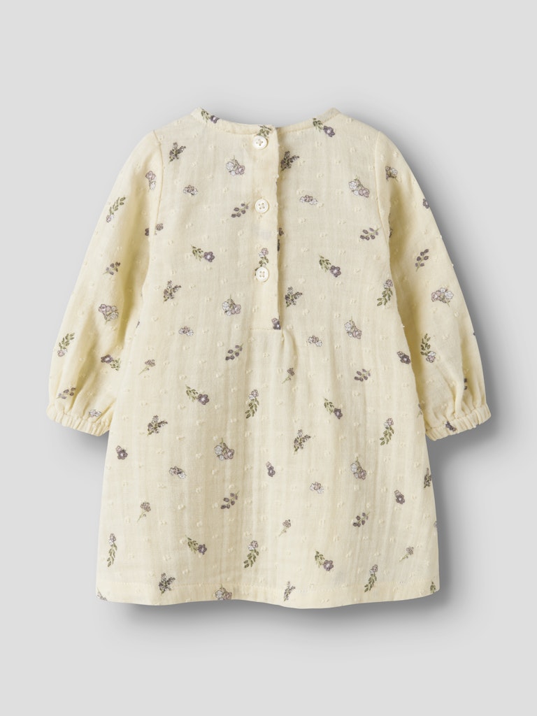 Ljus gul  baby klänning till nyfödd bebis flicka. Blommig bebis klänning, mönstrad klänning till baby. Ekologiska bebiskläder till nyfödd flicka.
NBFDORTHEA LS DRESS
13253624