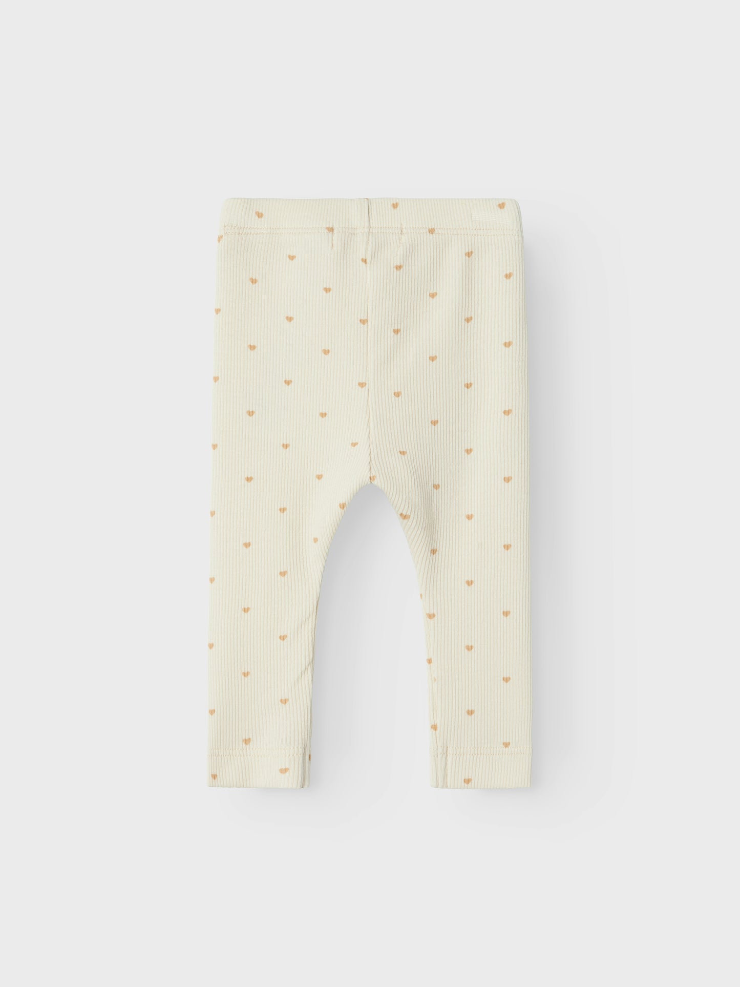 Ribbade leggings till liten flicka. Baby byxa, bebis tajts till liten tjej. Sätt ihop den perfekta outfiten för ditt barn med kvalitativa vardagsstilar och skapa en bekväm och trendig look. Jersey är ett lätt och stretchigt tyg med en mjuk yta och insida för en bekväm känsla och rörelsefrihet.

Produkttyp: Leggings
Extra detaljer: Resår i midjan, etikett
Utskrift: Utskrift upprepas över hela ytan av produkten
Passform: Slim Fit

Huvudmaterialet i denna produkt innehåller minst 50 % ekologisk bomull.