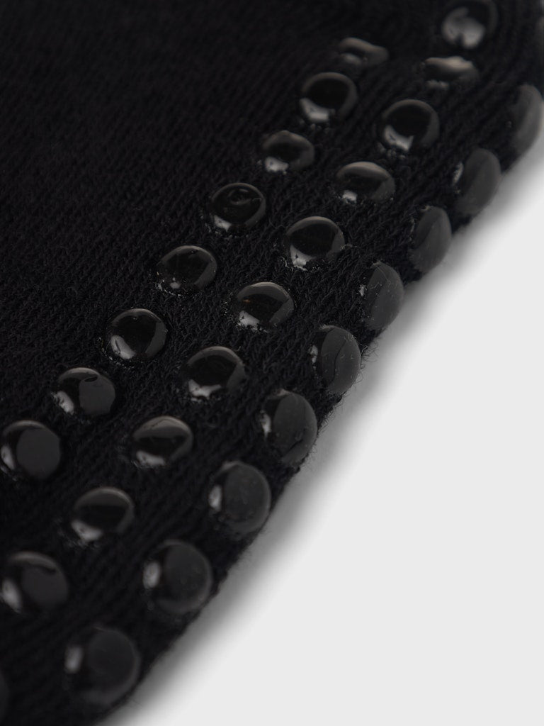 Svarta halkstrumpor i ull till flicka och pojke. Merino ull strumpor med halkpluttar.
NMMWAKSI WO/BL TERRY SOCK W/NON SKID
13229075