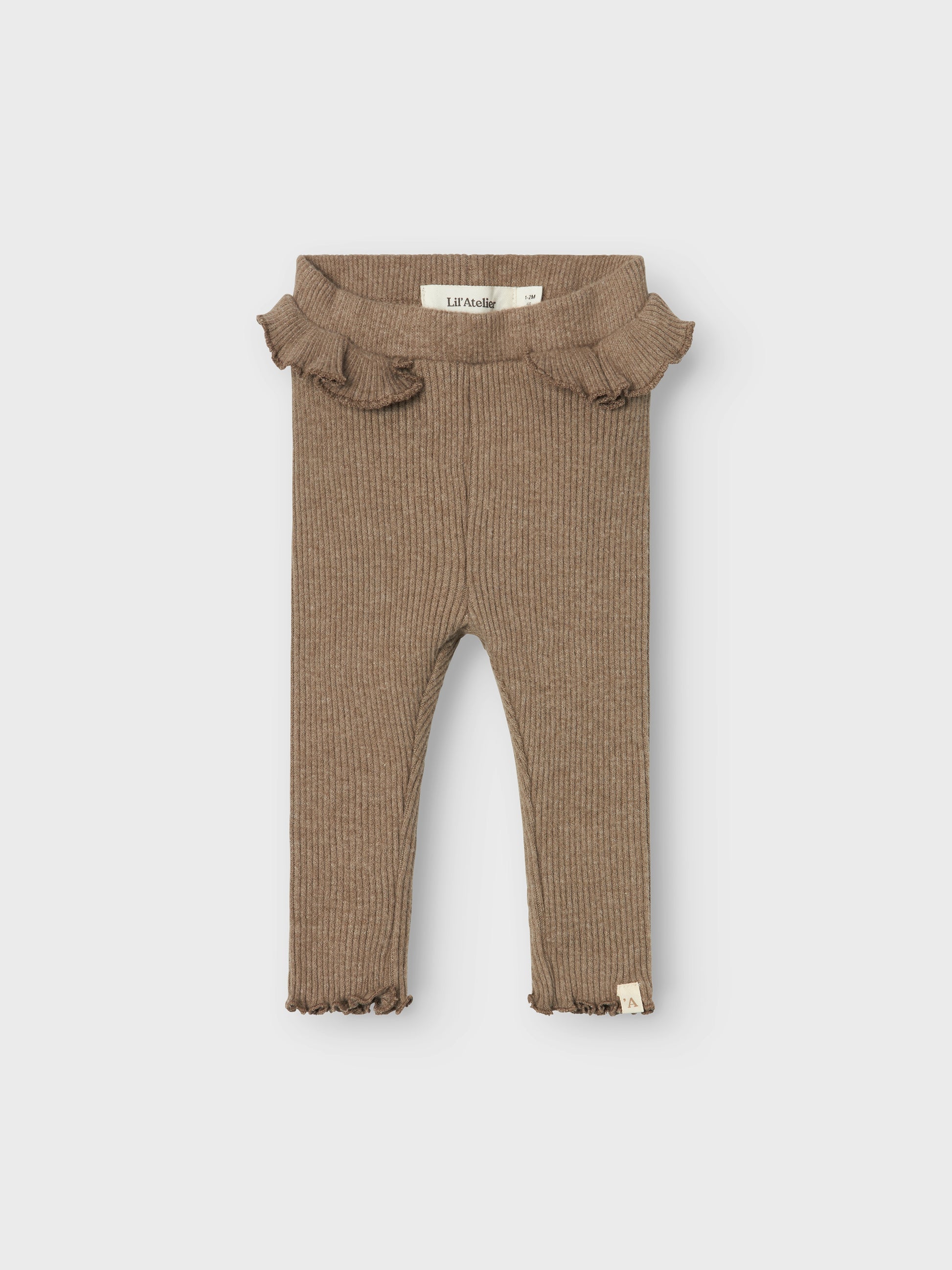 Söt baby byxa i brun ribbad ekologisk kvalitet. Bruna bebis leggings, byxor med volang i midjan för gullig och lite gammaldags stil på kläderna. Lil 'Atelier NBFSOPHIA