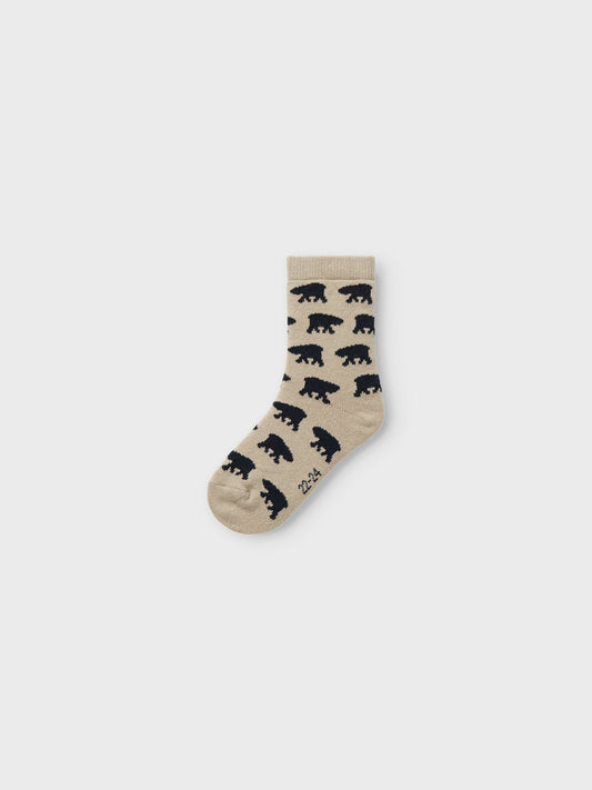 Beige barn strumpa med björnar på. Ekologiska strumpor till flicka och pojke.
