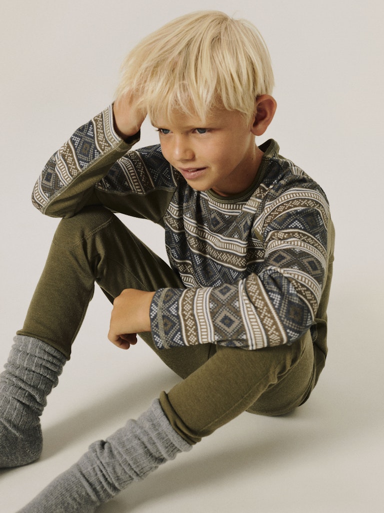 Grön merino ull underställs tröja till pojke. Barn kläder i varm och skön merinoull till kille från Nameit.
NKMWILLTO WOOL LS TOP
13229091