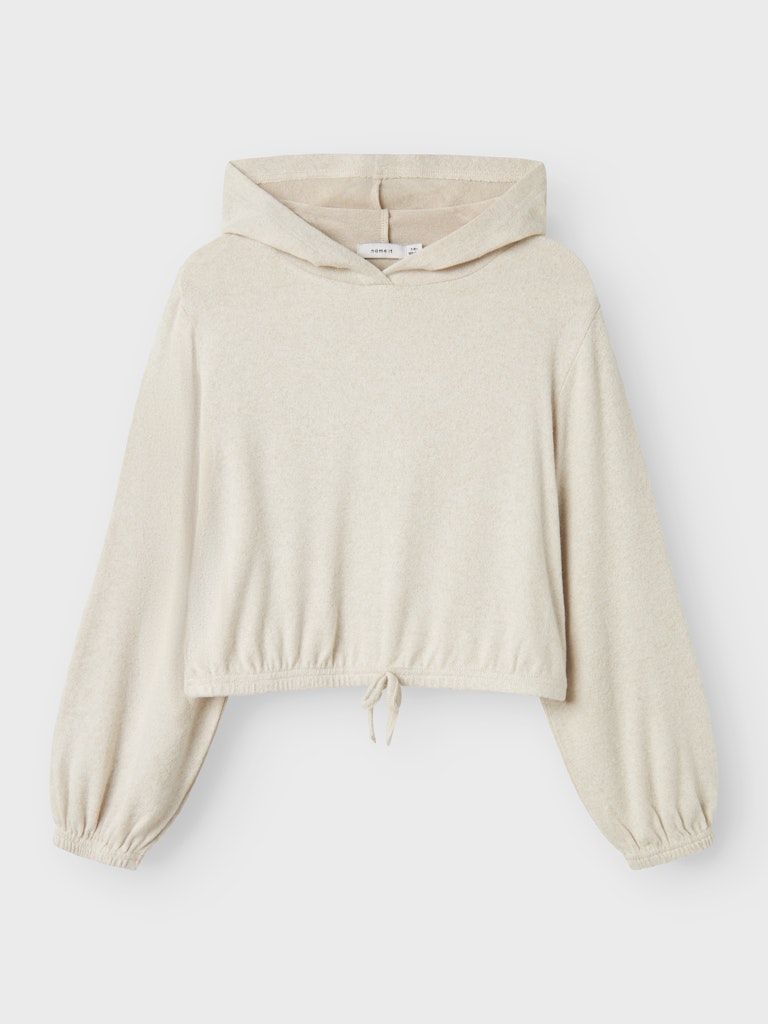 En stilren beige hoodie som passar både till vardag och helg – för tjejer som vill känna sig både bekväma och snygga!
NKFKATHLIN NREG SH LS TOP WH
13244712