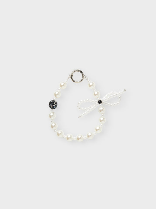 Nyckelring, bag charms av vita pärlor. 
NKFOLULU KEYHANGER
13247726