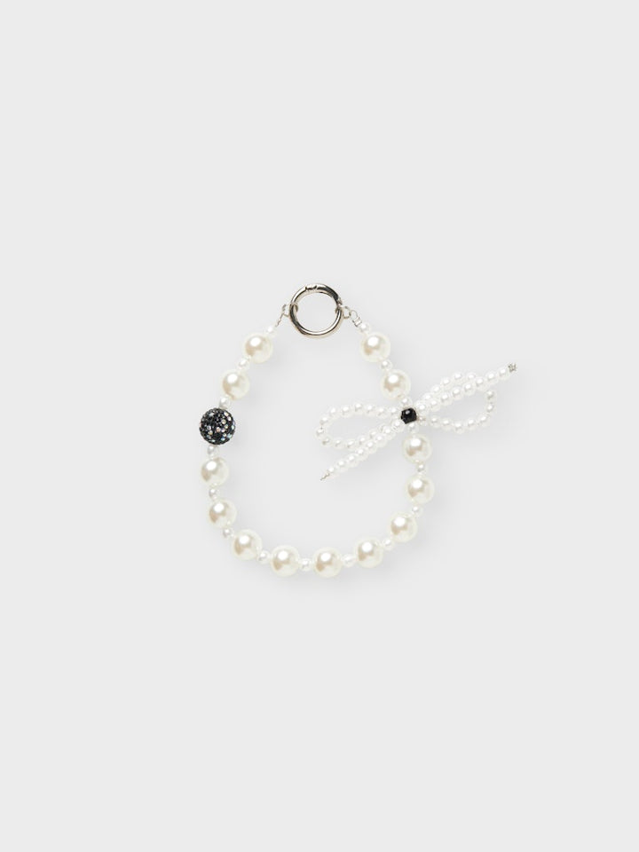 Nyckelring, bag charms av vita pärlor. 
NKFOLULU KEYHANGER
13247726