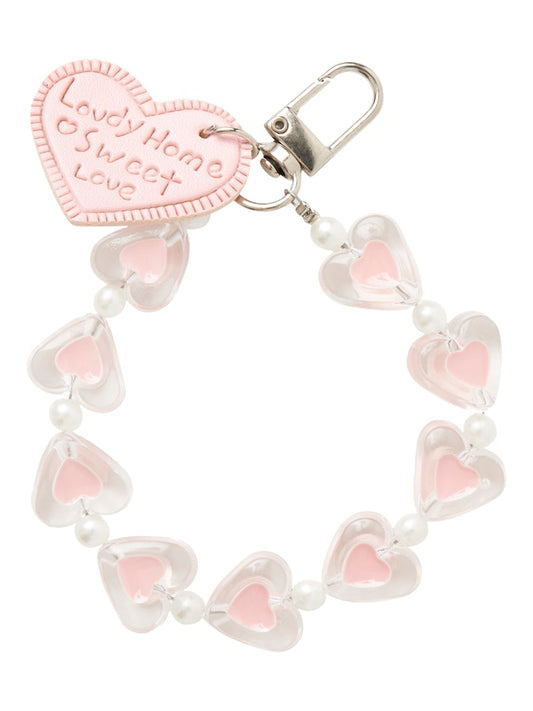 Nyckelring, bag charms i form av rosa små hjärtan. Väldigt söt dekoration till handväskan.
NKFOLULU KEYHANGER
13247726