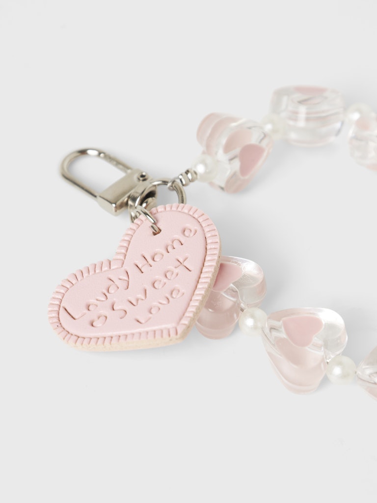 Nyckelring, bag charms i form av rosa små hjärtan. Väldigt söt dekoration till handväskan.
NKFOLULU KEYHANGER
13247726