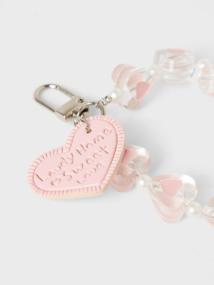 Nyckelring, bag charms i form av rosa små hjärtan. Väldigt söt dekoration till handväskan.
NKFOLULU KEYHANGER
13247726