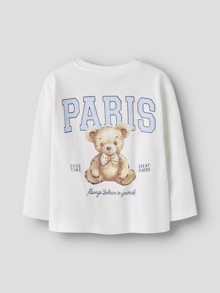 Vit tröja med söt nalle på ryggen. Ekologiska barnkläder från Nameit till flicka. Nalle i Paris.
NMFREARAJA NREG LS TOP
13249331
