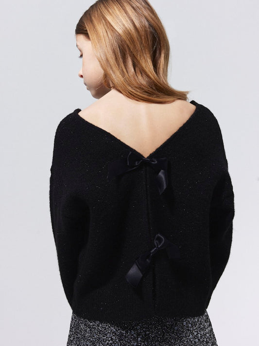 Svart festlig glitter tröja med rosetter i ryggen. Tröja till flicka, tjej barn och ungdoms kläder från Nameit.
NKFSIMRA LS SH KNIT
13250466