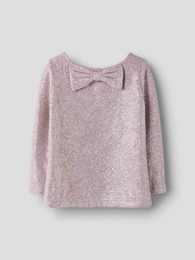 Rosa glitter topp med rosett bak i nacken. Söt festlig tröja till flicka från Name it.
NMFDITSA LS TOP
13256276