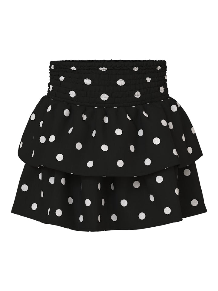 Svart volang kjol med vita prickar till flicka. Festlig kjol från Nameit.
NMFSALLIE SKIRT
13259475