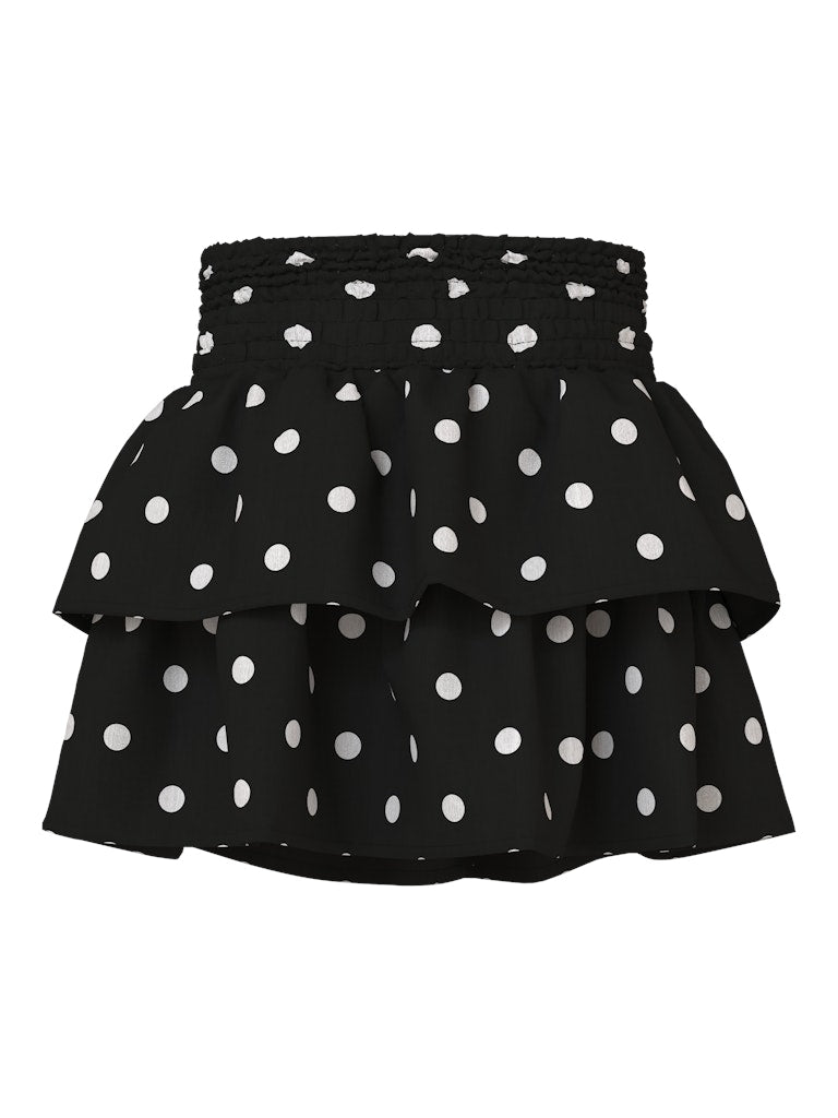 Svart volang kjol med vita prickar till flicka. Festlig kjol från Nameit.
NMFSALLIE SKIRT
13259475