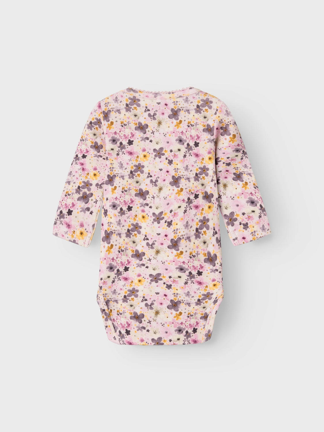 Blommig rosa baby body i mjukaste kvalitet. Superfin body till din lilla bebis flicka.