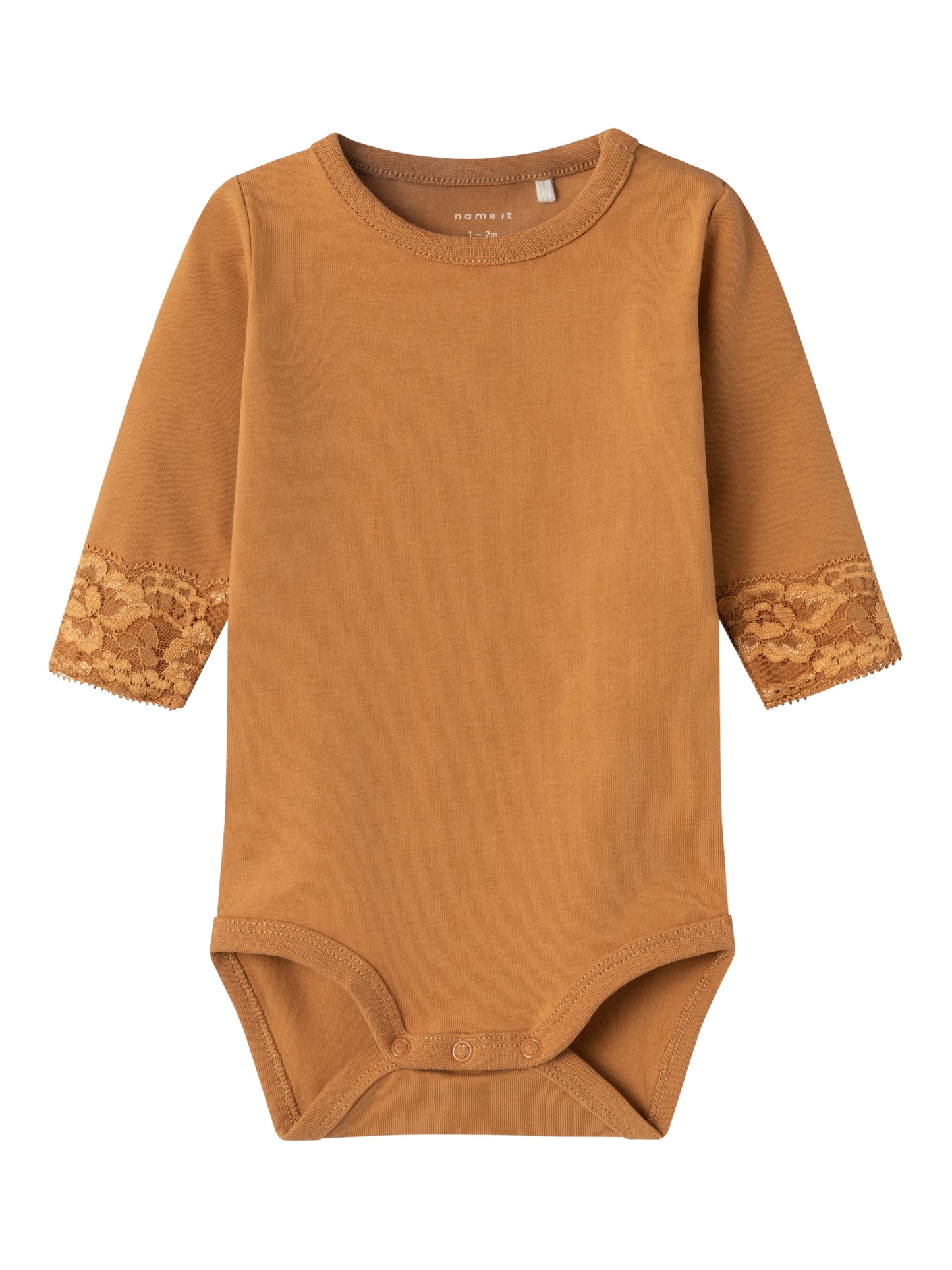 Långärmad body med söt spetskant vid handen. Ekologisk baby body i fin brun färg. Bebiskläder, bodysuit.