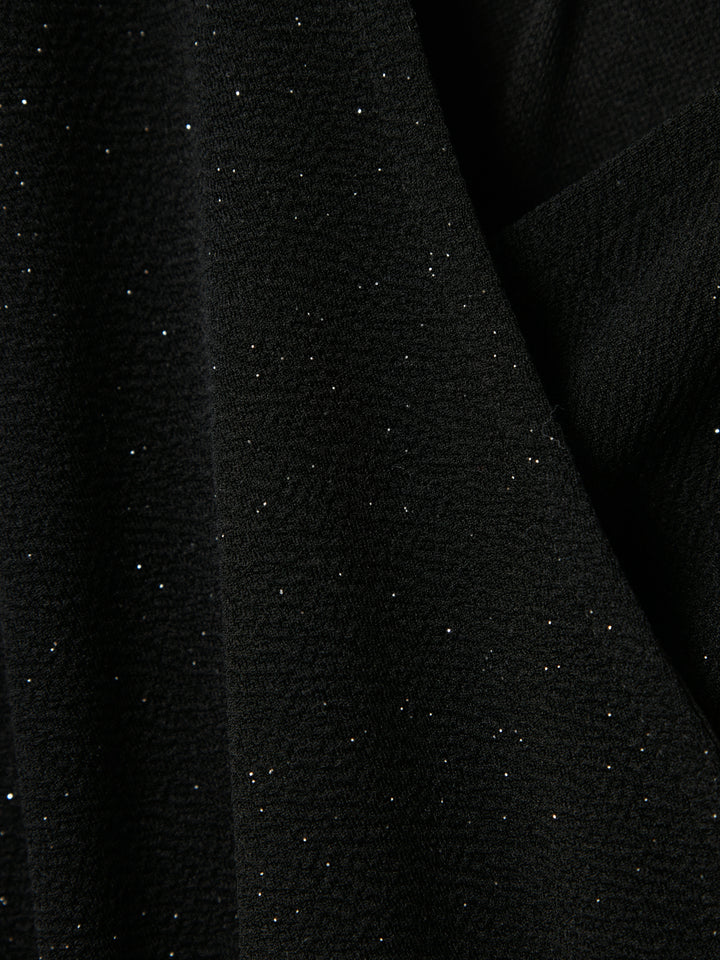 Svart glittrig jumpsuit till flicka. Festlig onepiece till tjej med lång ärm och silverglitter i mjuk, mysig kvalitet.
NKFROKA LS JUMPSUIT
13236194