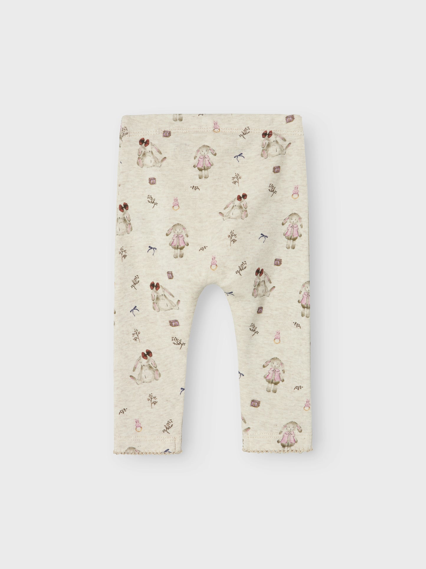 Söt baby byxa med beige botten och söta små kaniner överallt. Ekologisk bebis leggings till liten flicka, tjej.