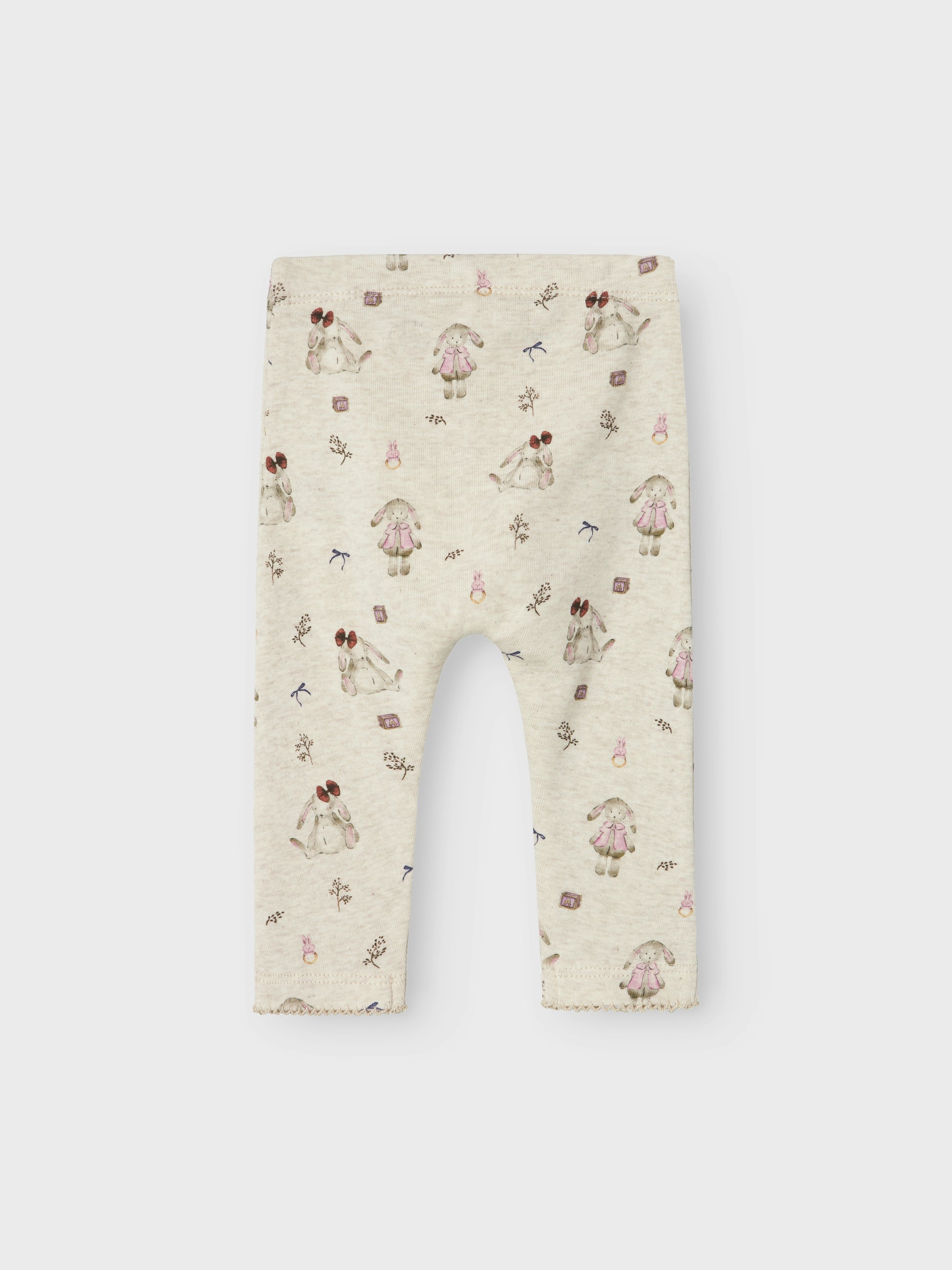 Söt baby byxa med beige botten och söta små kaniner överallt. Ekologisk bebis leggings till liten flicka, tjej.