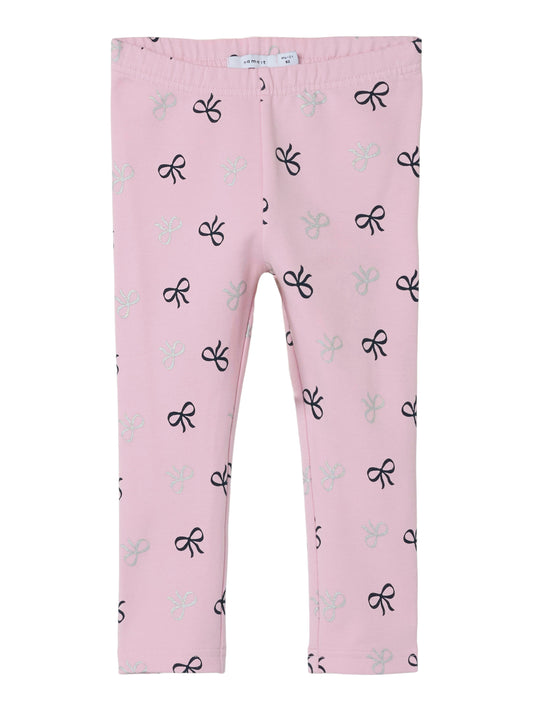 Rosa barn leggings med söta rosetter på. Ekologiska byxor till liten flicka, tjej från Name it. Sweatshirt leggings, lite tjockare och varmare för en skön dag.