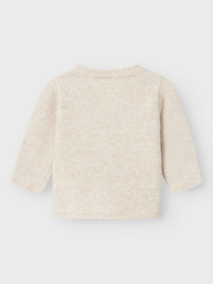 Söt stickad beige baby kofta med spets vid knapparna. Bebis kofta, cardigan NBFRIKIMMI till baby flicka, tjej.
NBFRIKIMMI LS KNIT CARD
13237555 