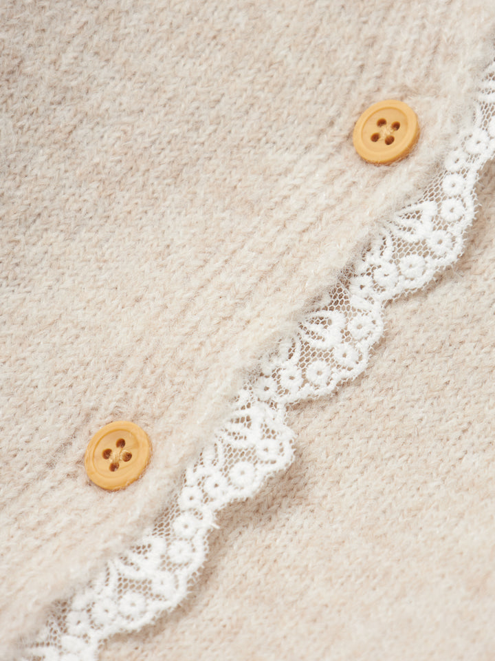 Söt stickad beige baby kofta med spets vid knapparna. Bebis kofta, cardigan NBFRIKIMMI till baby flicka, tjej. 
NBFRIKIMMI LS KNIT CARD
13237555