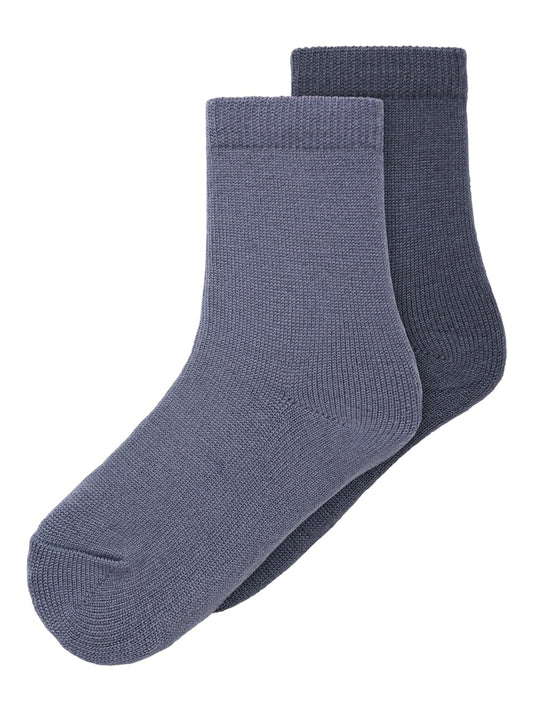 Blå 2-pack tunn strumpor i merino ull till pojke. 
NMMWAKTA WO/VI 2P SOCK
13229076