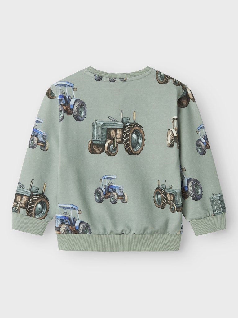 Ljus grön sweat tröja med traktorer till pojke. Ekologiska barnkläder från Name it.
NMMLUDVIG LS NREG SWEAT UNB
13244945