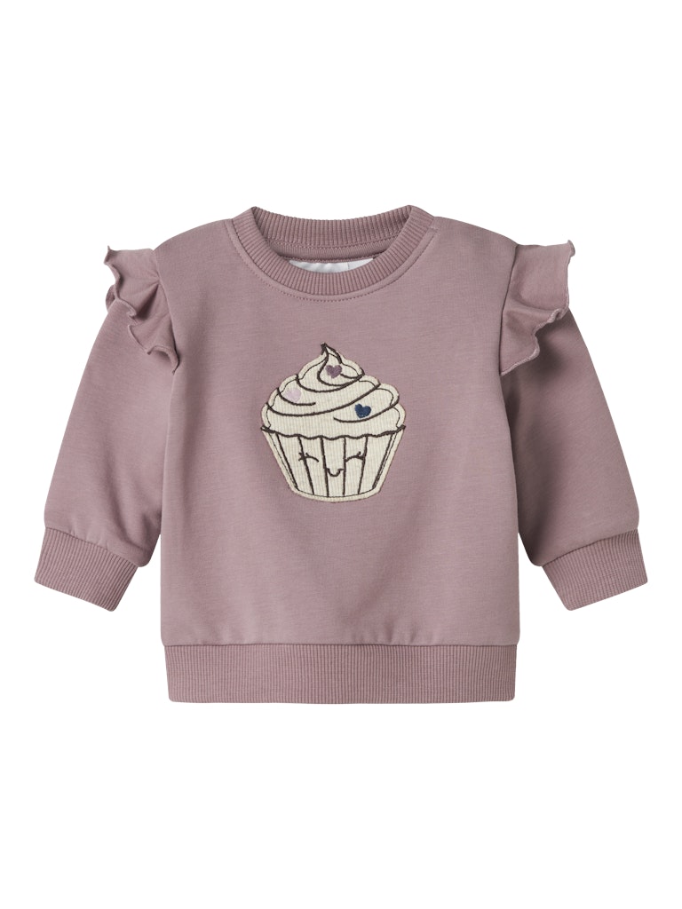 Gullig lila bebis tröja till flicka. Baby topp med volanger  och en påsydd cupcake. Ekologiska barnkläder från Name it.
NBFNILDA LS SWEAT BRU
13246489