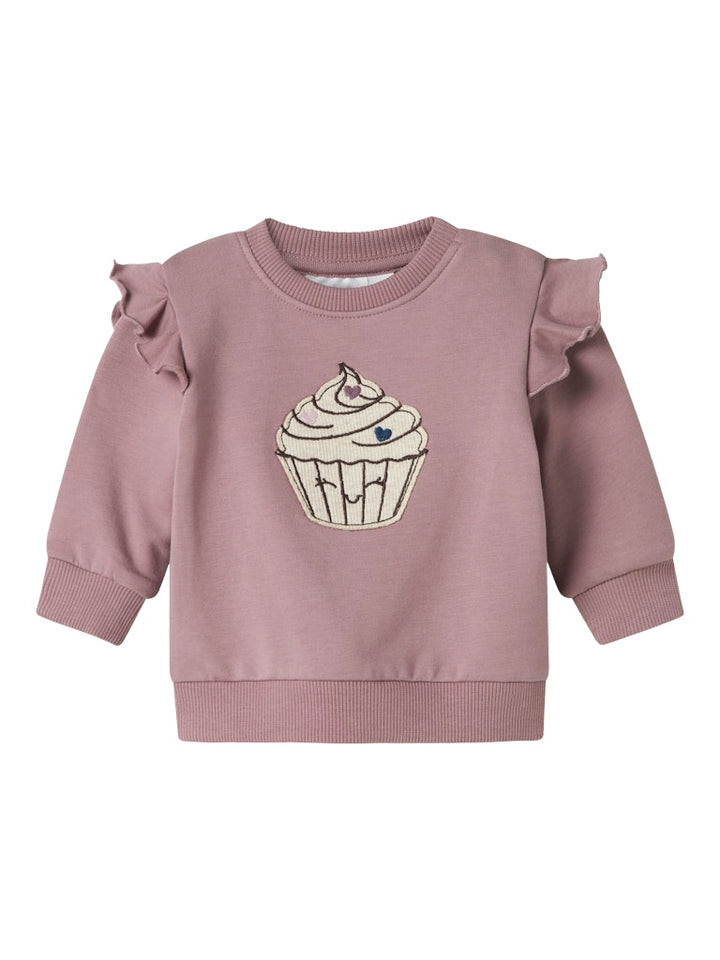 Gullig lila bebis tröja till flicka. Baby topp med volanger  och en påsydd cupcake. Ekologiska barnkläder från Name it.
NBFNILDA LS SWEAT BRU
13246489