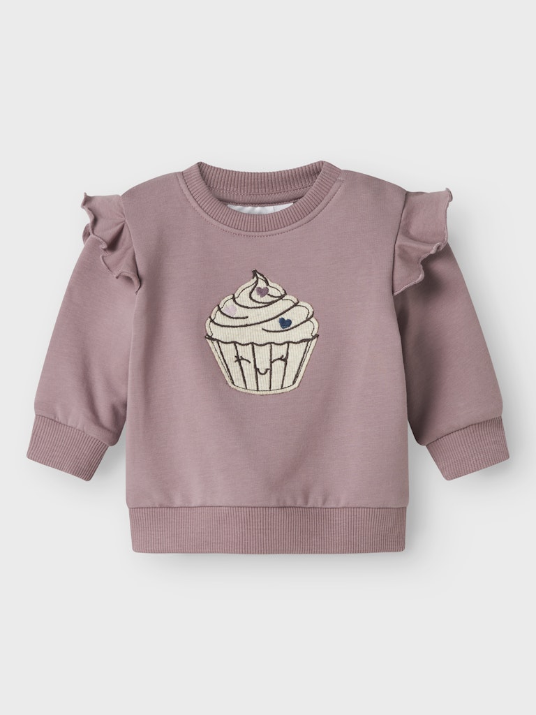 Gullig lila bebis tröja till flicka. Baby topp med volanger  och en påsydd cupcake. Ekologiska barnkläder från Name it.
NBFNILDA LS SWEAT BRU
13246489