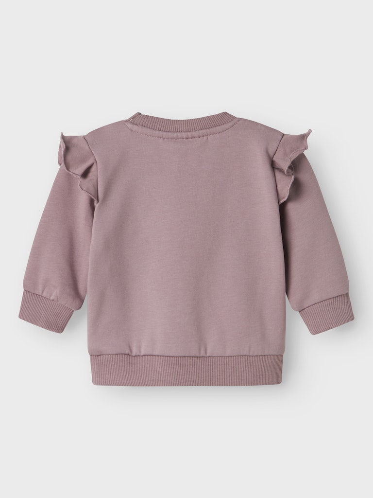 Gullig lila bebis tröja till flicka. Baby topp med volanger  och en påsydd cupcake. Ekologiska barnkläder från Name it.
NBFNILDA LS SWEAT BRU
13246489