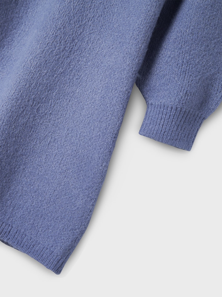 Blå stickad långärmad klänning till flicka, tjej.
Långärmad klänning från Name it.
NKFOMARIAN LS KNIT DRESS
13233091