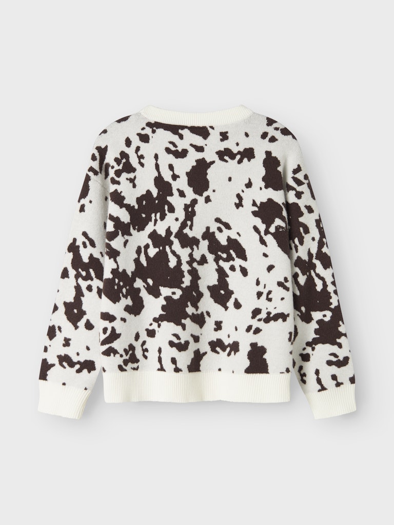 Vit stickad tröja med ko mönster i brun till flicka. Tjock tröja till tjej i mjuk skön kvalitet från Name it.
NKFORKIDE LS KNIT
13247669