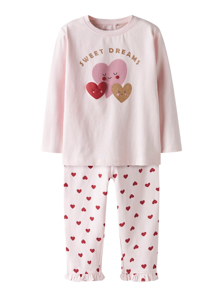 Söt hjärtan pyjamas till liten flicka. Mönstrad rosa pyjamas från Nameit i ekologisk bomull.
NMFRAGNA NIGHT SET BOX
13249385