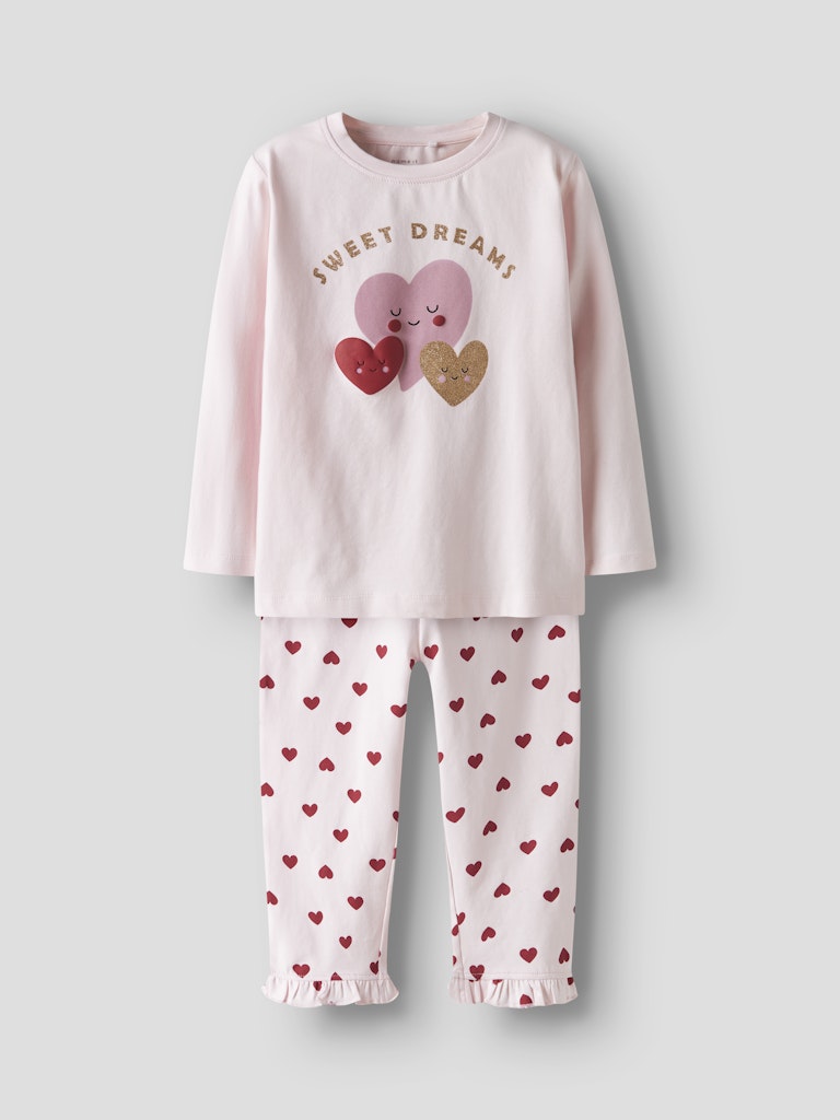 Söt hjärtan pyjamas till liten flicka. Mönstrad rosa pyjamas från Nameit i ekologisk bomull.
NMFRAGNA NIGHT SET BOX
13249385