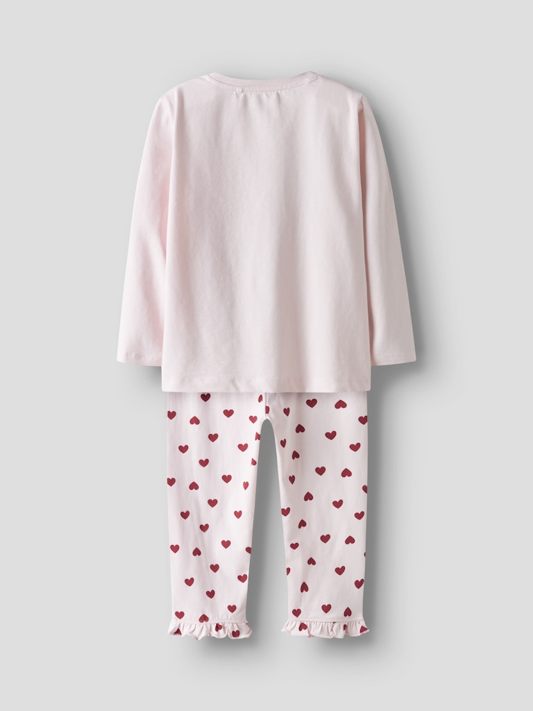 Söt hjärtan pyjamas till liten flicka. Mönstrad rosa pyjamas från Nameit i ekologisk bomull.
NMFRAGNA NIGHT SET BOX
13249385
