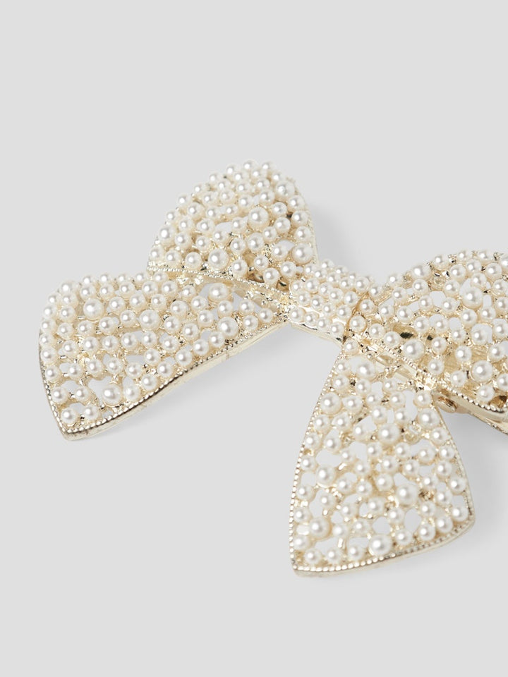 Vackert hårspänne i form av rosett gjort av pärlor. Hårklämma till flicka, tjej barn och ungdom.
NKFRITA HAIRCLIP
13250379