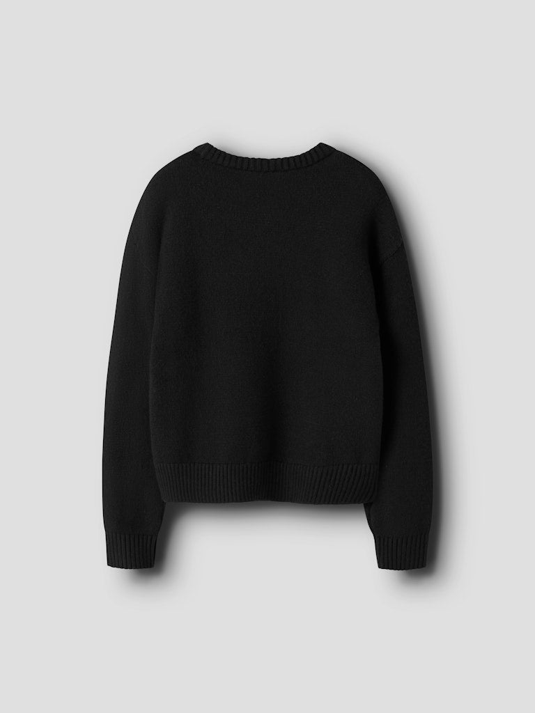 Svart stickad tröja med rosetter till flicka. Tjej tröja i svart och vitt, fin till både vardag och fest.
NKFSONJA LS KNIT
13237617