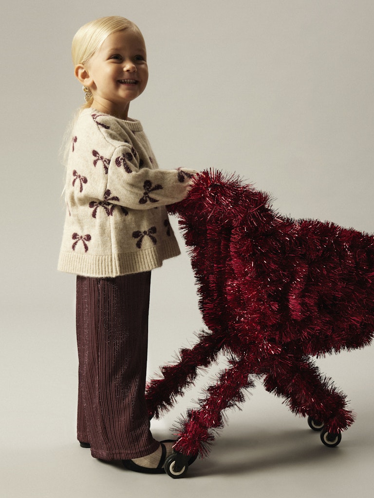 Stickad Rosett Tröja